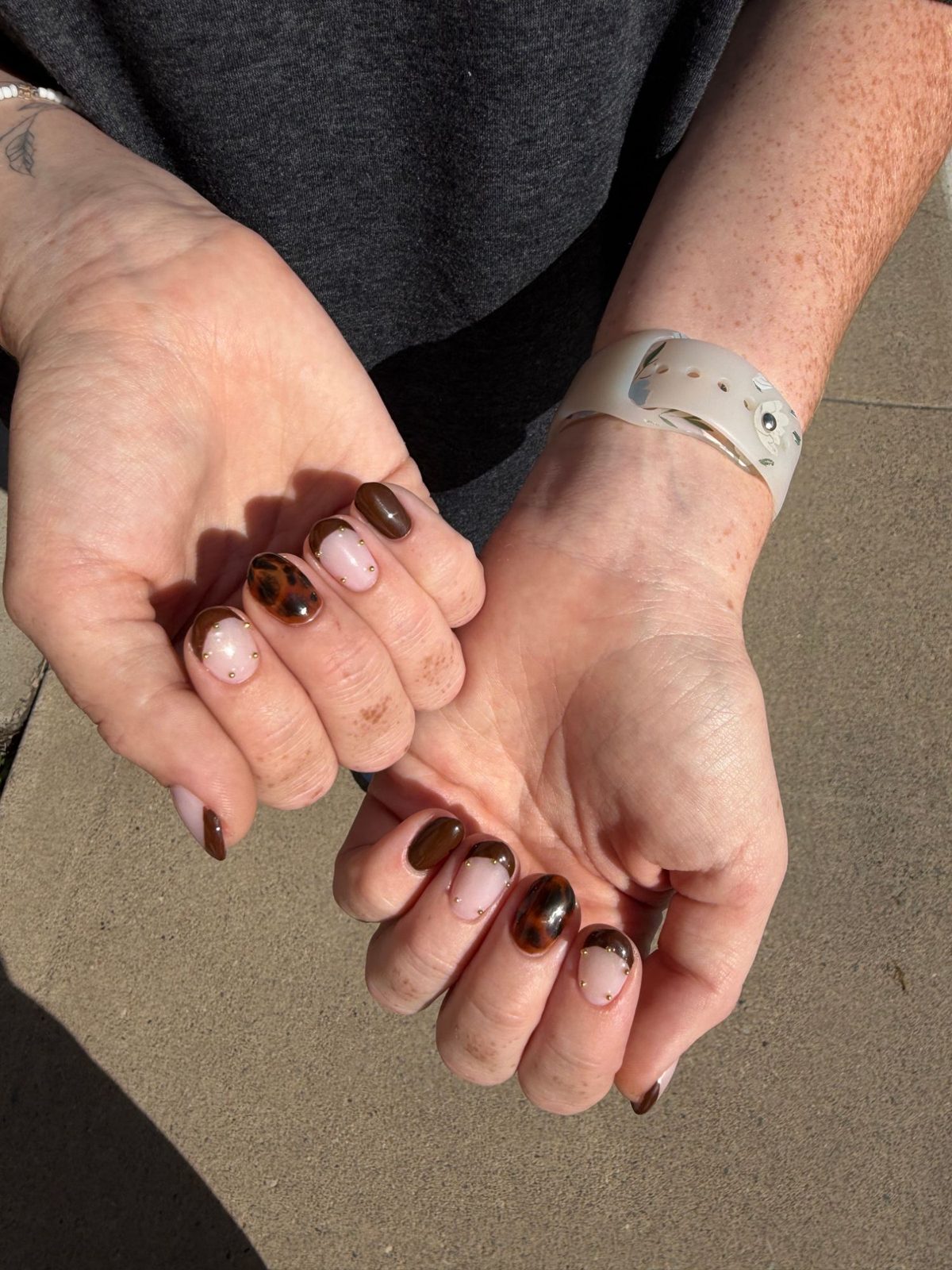 Tortoiseshell and chocolate brown nail art with gold bead accents